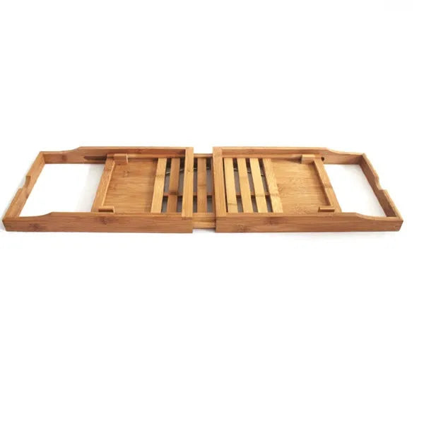 Bamboo desktop storage shelf for bathroom organisation next to bathtub