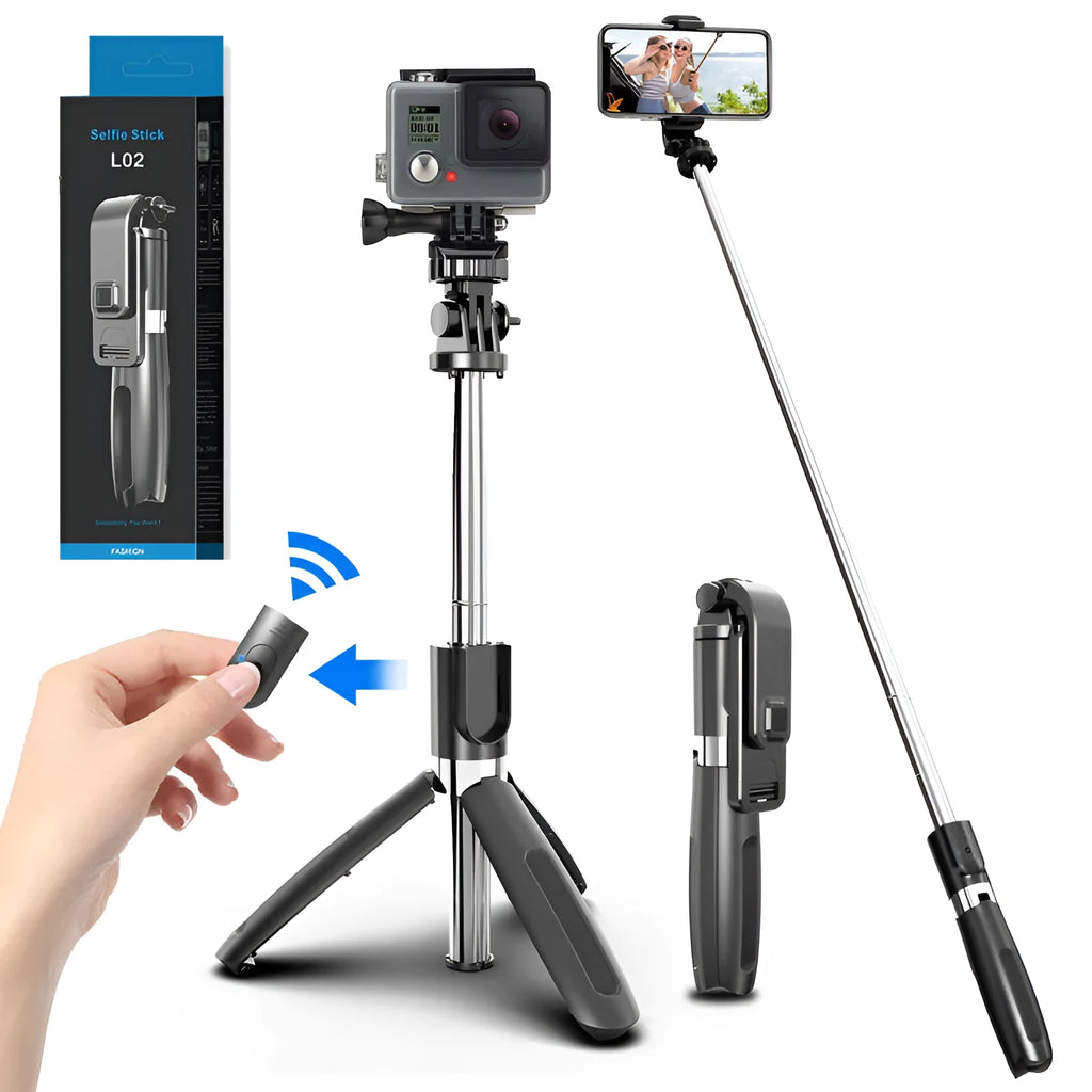 Black and white Bluetooth selfie stick with wireless remote, extended on a tripod base next to a smartphone.