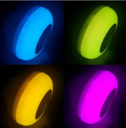 White Bluetooth speaker LED bulb with E27 base showing RGB colour options and remote control
