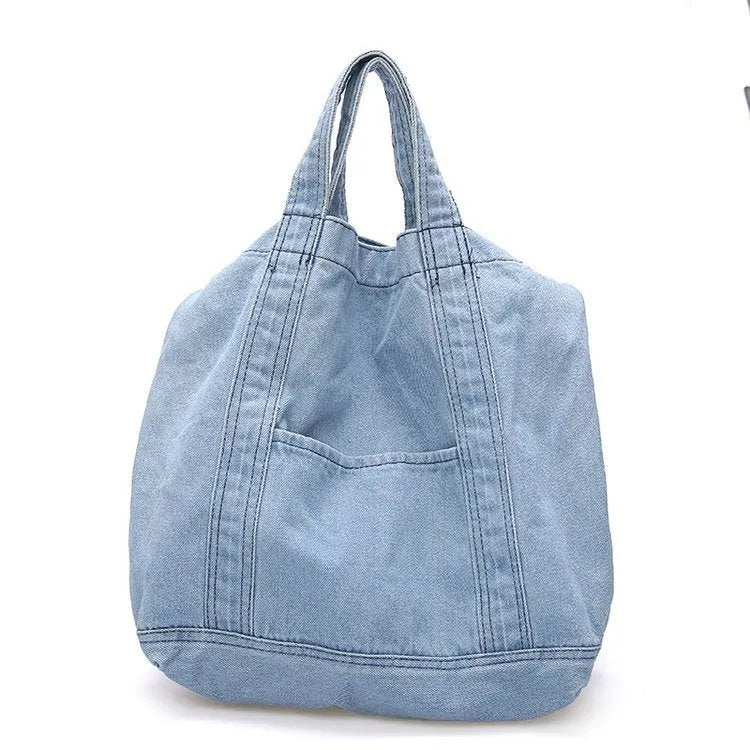 Large canvas denim tote bag in dark blue with polyester lining and horizontal square shape
