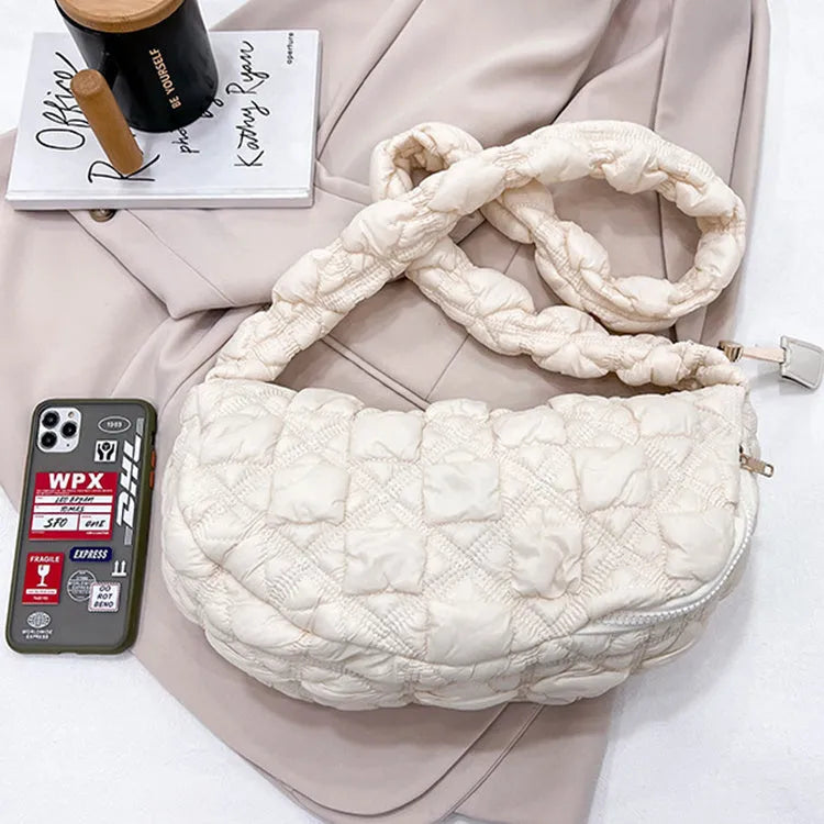 Women's casual nylon messenger bag in beige colour, showing front view with shoulder strap.