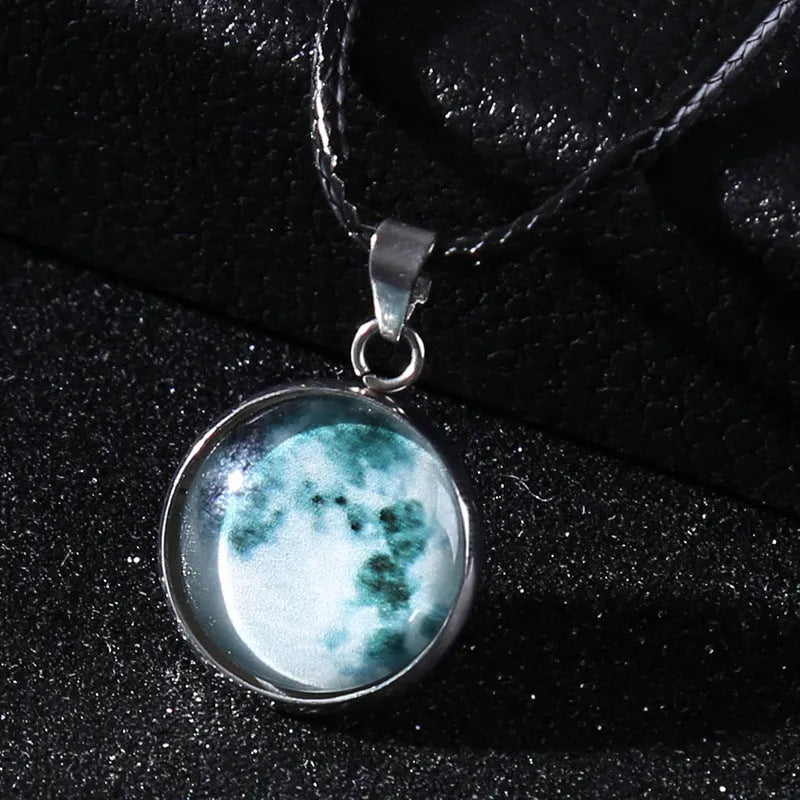 Luminous alloy unisex necklace with organic glass constellation pendant on adjustable glass chain.