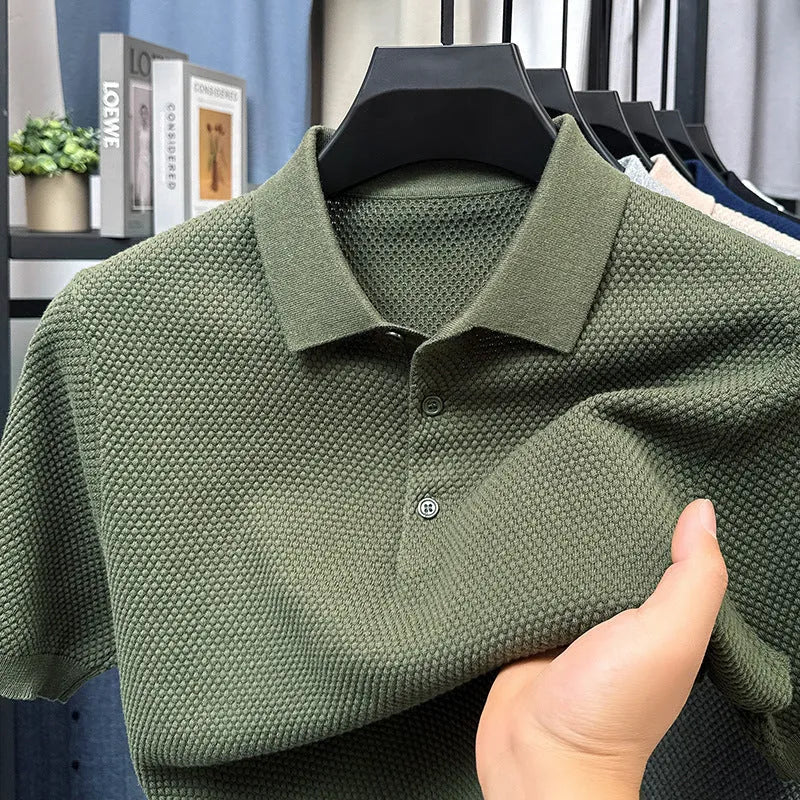 Loose fit pure cotton short sleeve pullover sweater in grey on a hanger.