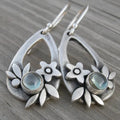 Silver alloy drop earrings with teardrop floral and leaf design