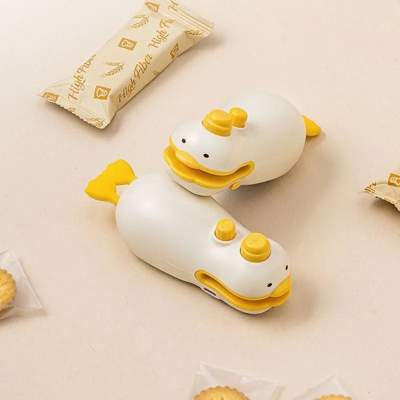 Small yellow duck pattern rechargeable sealing machine with included charging cable