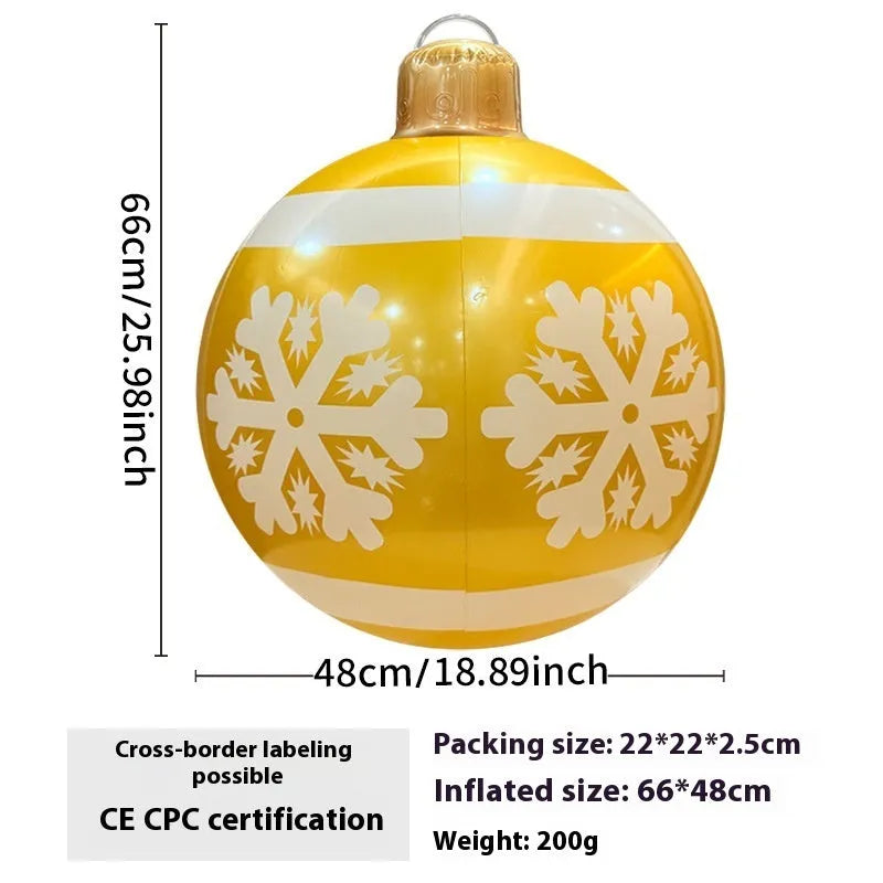 Large inflatable Christmas ball decoration with LED lights in garden setting