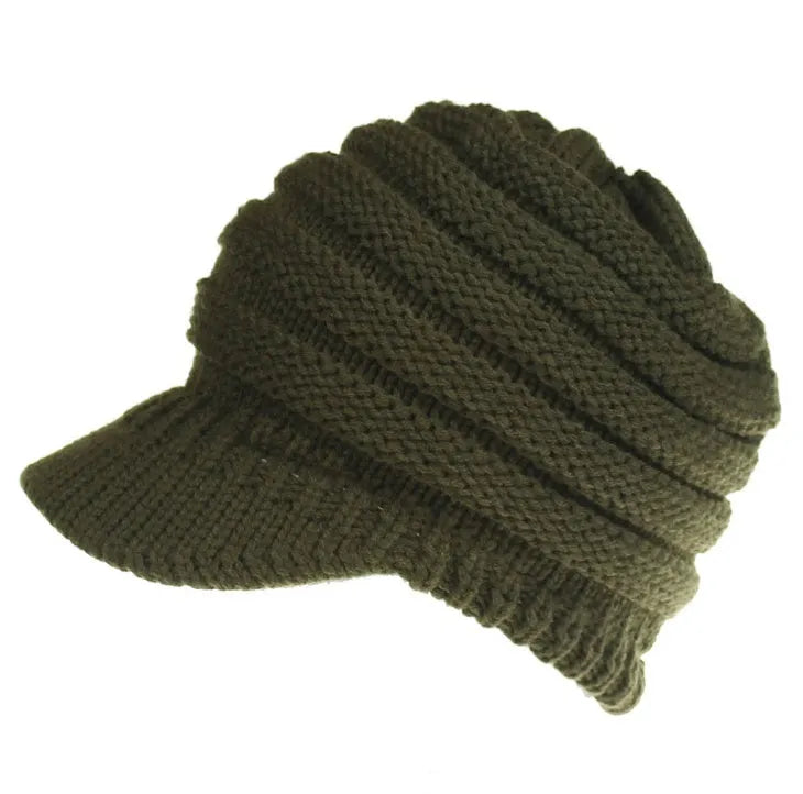 Women's knitted ponytail beanie with hair hole opening in acrylic yarn, shown in beige colour