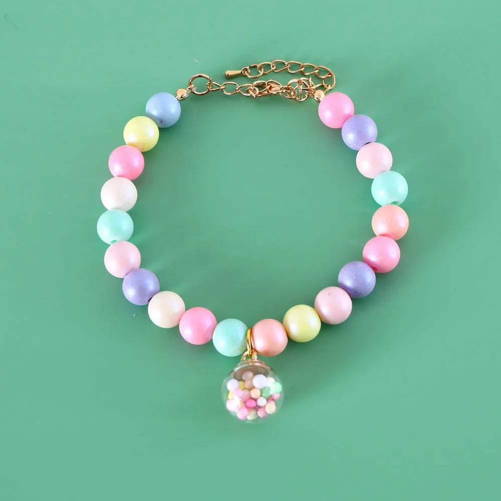 Colourful macaron-themed resin pet jewellery set with adjustable collar and bracelet for dogs and cats