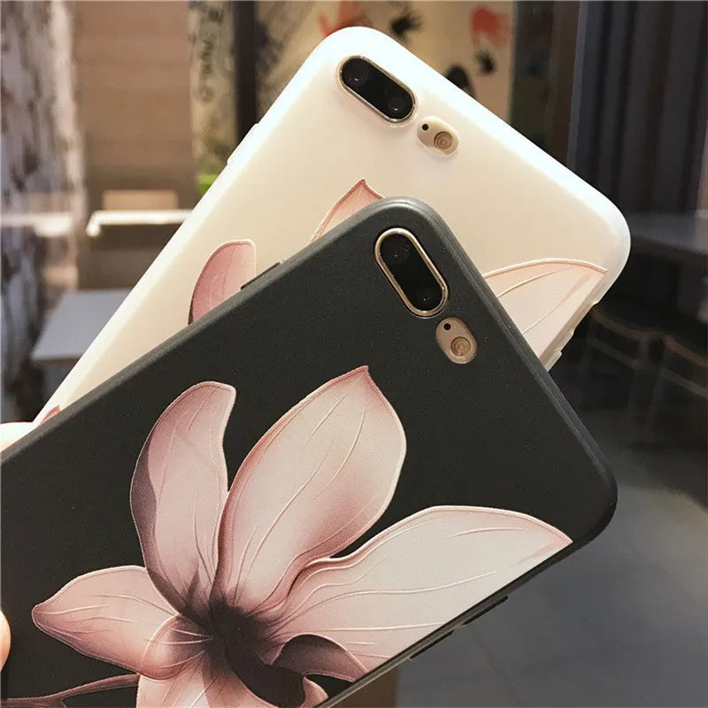 Black embossed flower design on a slim TPU iPhone case for iPhone 11.