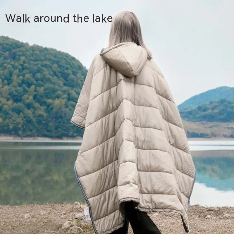 Army green outdoor cloak sleeping bag laid flat showing its 200x140cm size and wearable hood design.