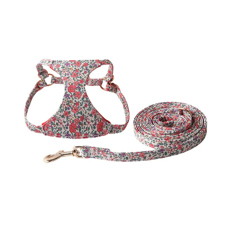 Floral pattern pet harness suit with matching leash in cloth material showing size options