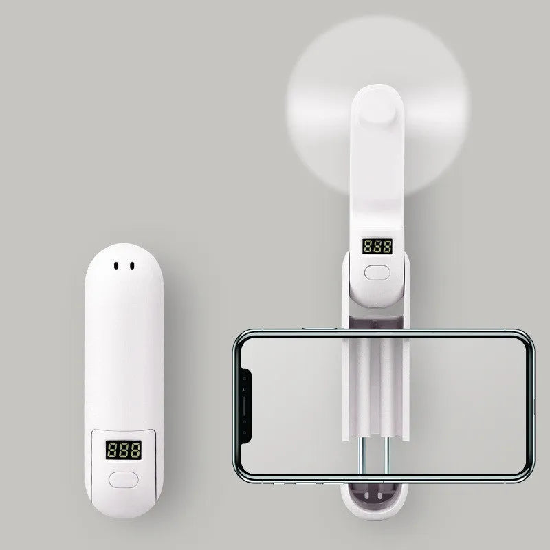 Green folding handheld mini fan with USB charging cable
