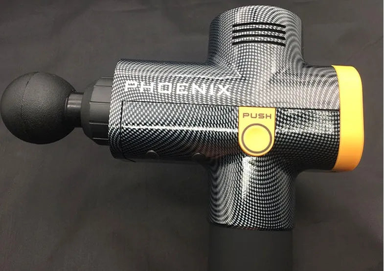 Black fascia massage gun with four different coloured massage heads on a grey background.