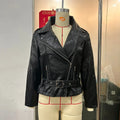 Punk style leather jacket with locomotive lapel and Peter Pan collar in polyester construction