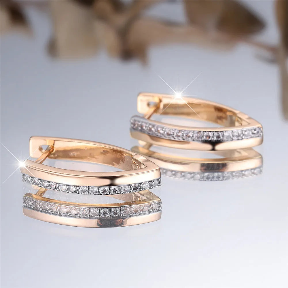 Geometric V-shaped women's clip-on earrings with champagne gold electroplating and white diamond accents