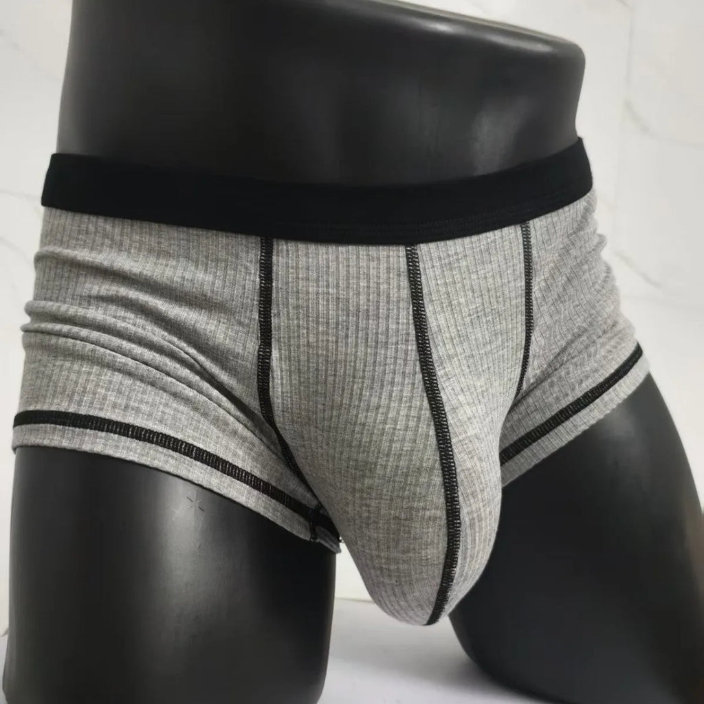 Men's solid colour breathable boxers in army green, shown flat.