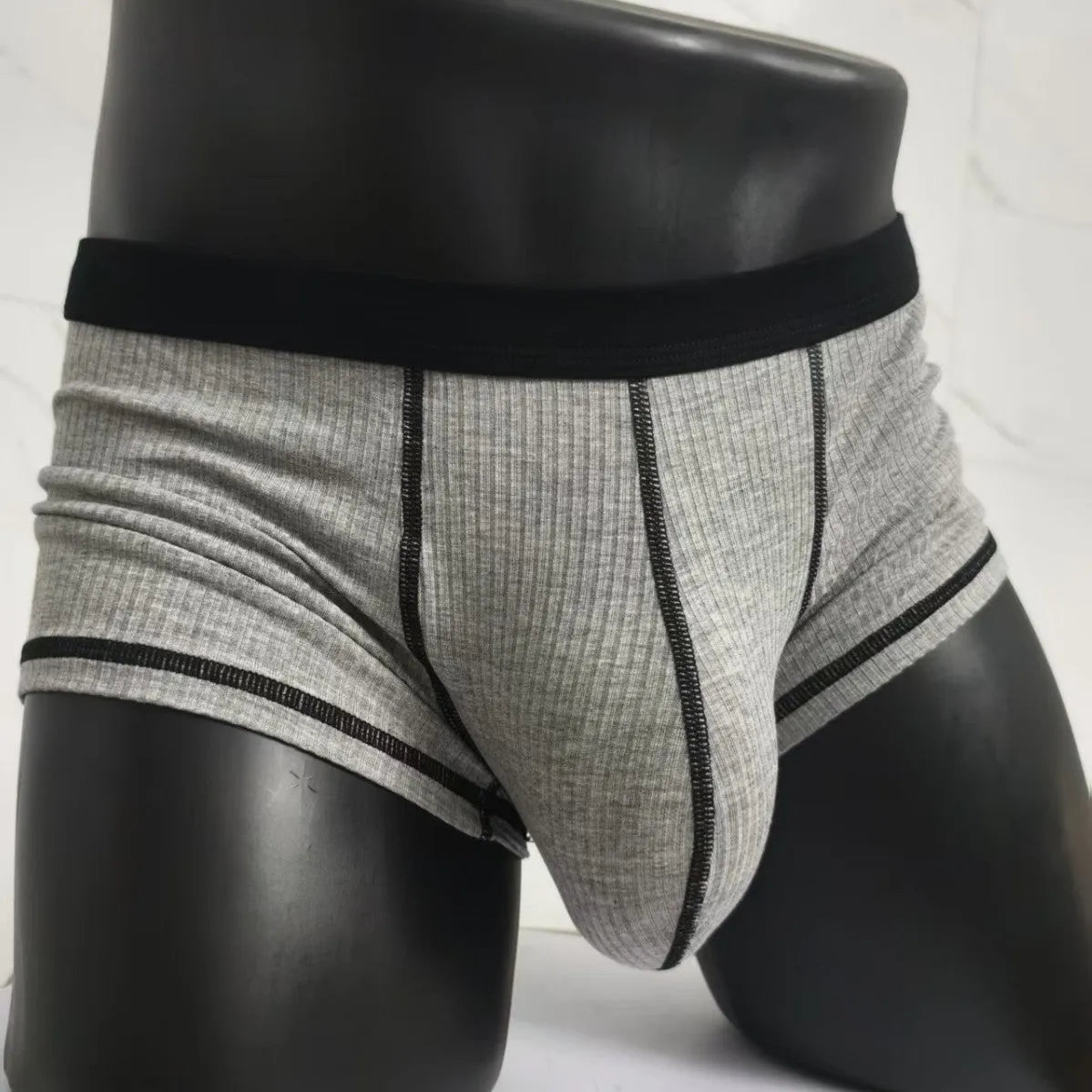 Men's solid colour breathable boxers in army green, shown flat.
