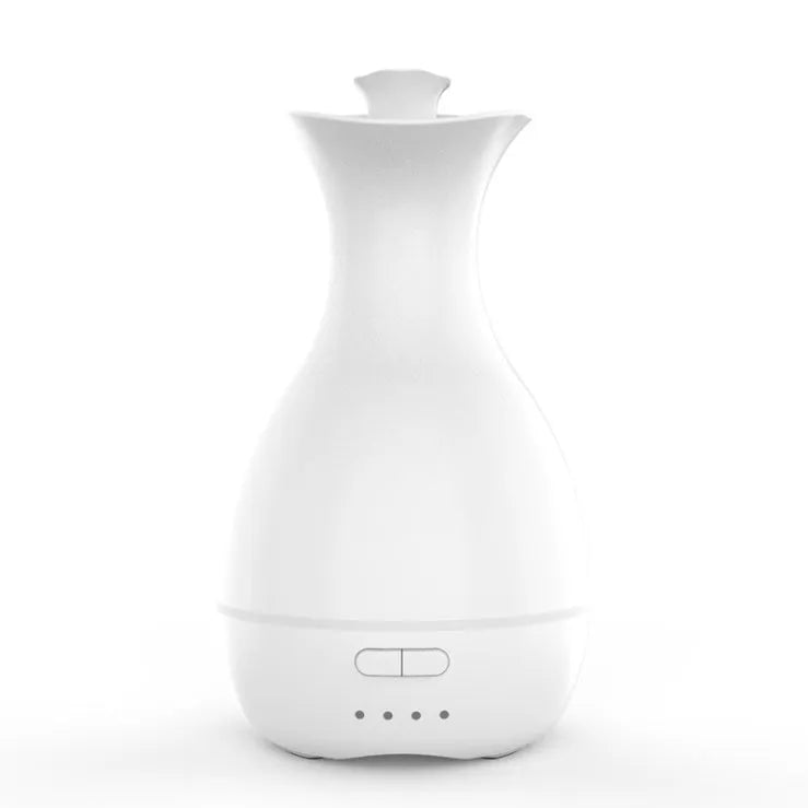 White ultrasonic humidifier and essential oil diffuser with colourful LED night light and 200ml water tank