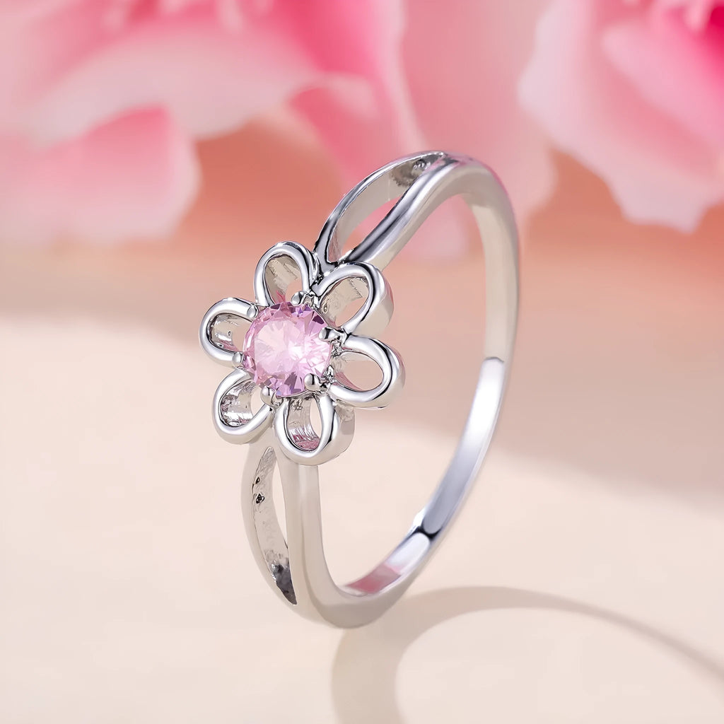 Lady's hollowed floral fashion ring in electroplated copper, platinum pink diamond colour.