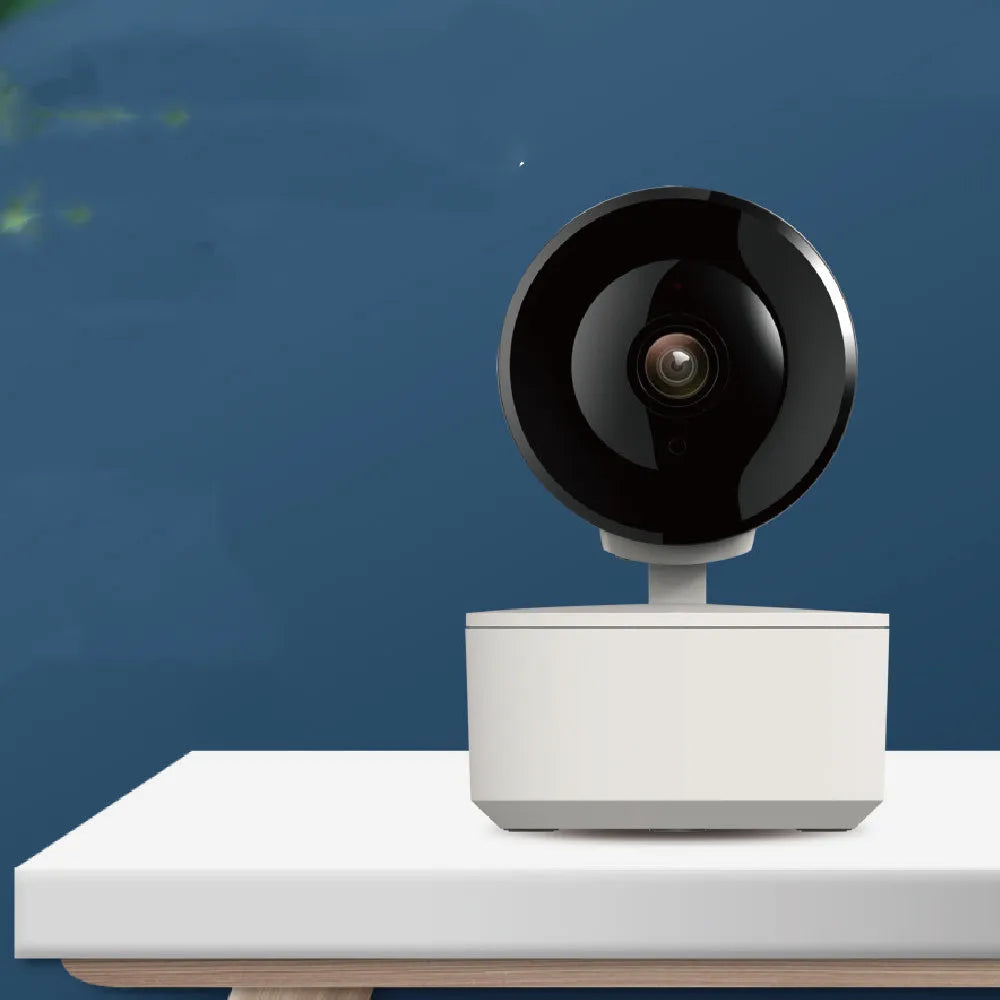 Indoor smart Wi‑Fi security camera with 1080P resolution and pan‑tilt‑zoom on a desktop.