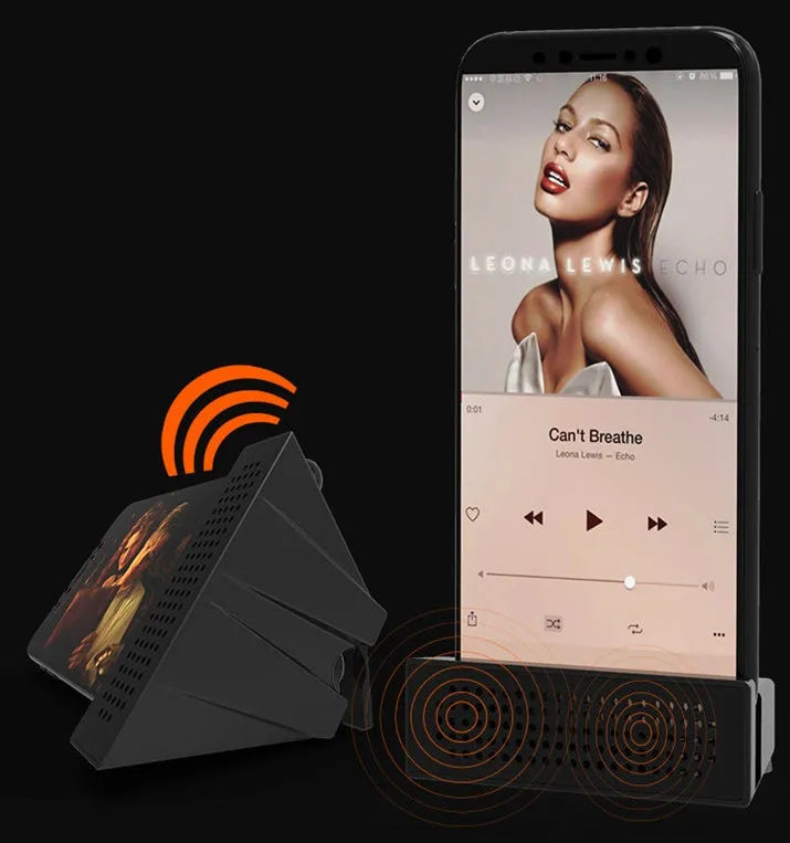 Portable Apple-compatible phone amplifier bracket in multiple colours on desktop