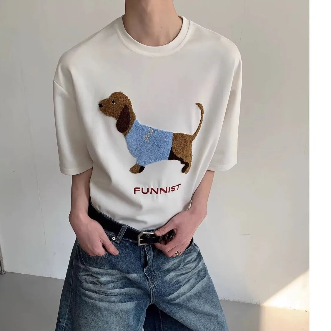 Grey men's t-shirt with embroidered sausage dog in a towel design on the front.