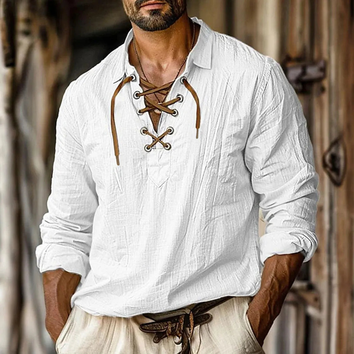 Men's loose fit long sleeve shirt with lapels and lace detail in a blue cotton-linen fabric.