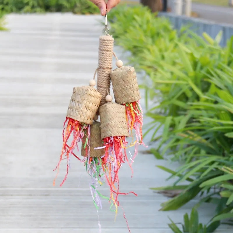 Wooden frame parrot toy with sisal rope and colourful shredded paper strips measuring 15cm by 35cm