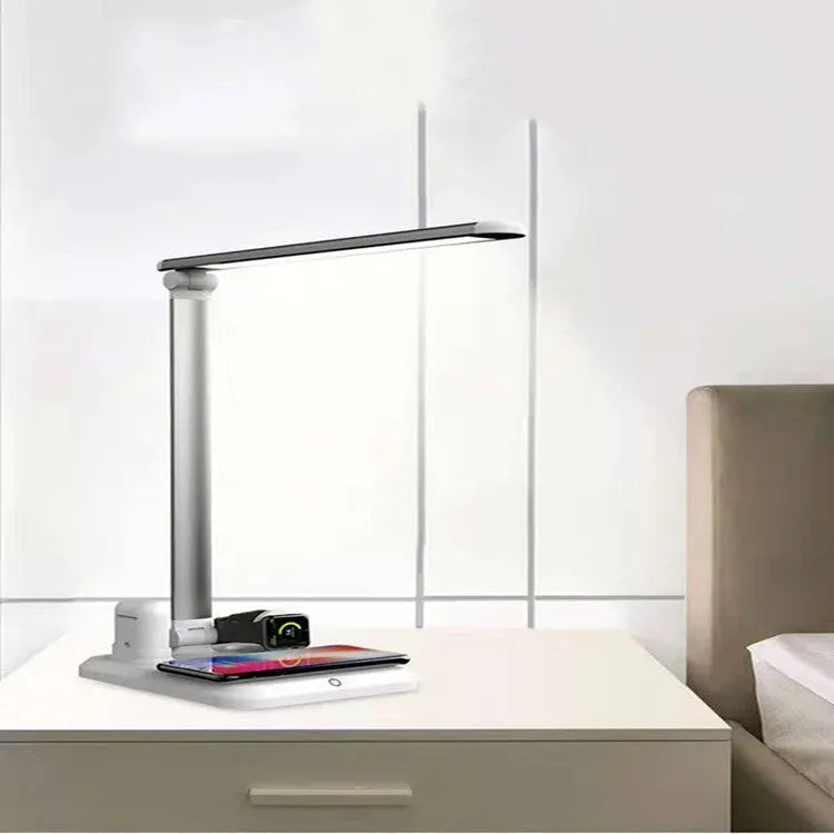 Black and white 4-in-1 LED desk lamp with wireless charging pad and USB-C port
