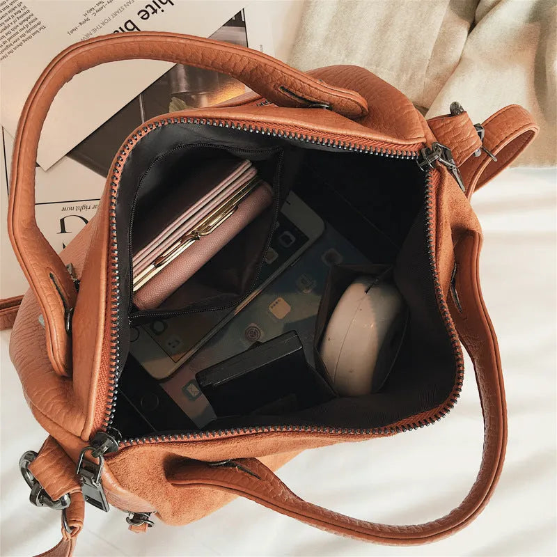 Soft PU women's casual tote shoulder bag in black, brown, or grey with a zip closure.