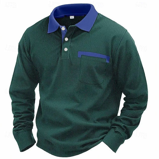 Man modelling a loose-fit long-sleeved waffle-knit polo shirt in a solid colour with an asymmetrical style detail.
