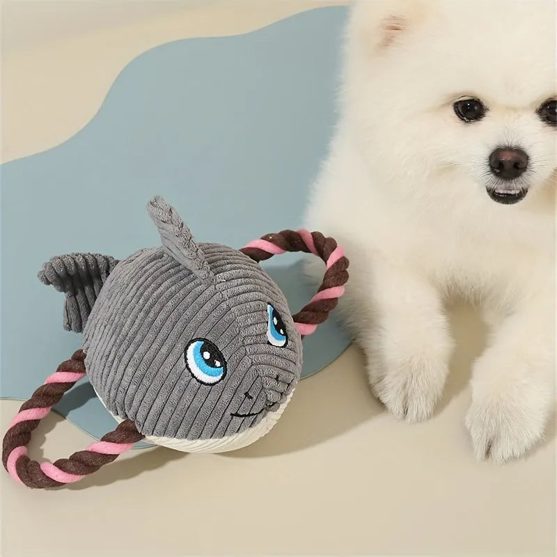 Grey, green, and orange turtle-shaped plush dog chew toy with knotted texture