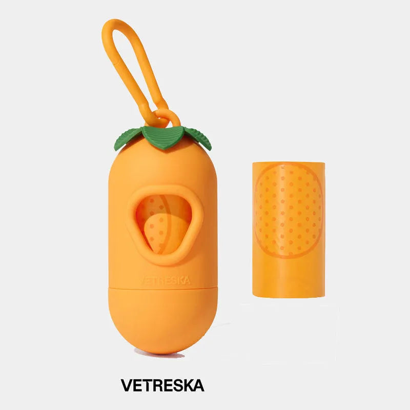 Refillable plastic dog poo bag dispenser capsule with a roll of scented biodegradable bags in strawberry design.