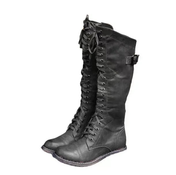 Women's black chunky low heel ankle boots with round toe and high shaft design