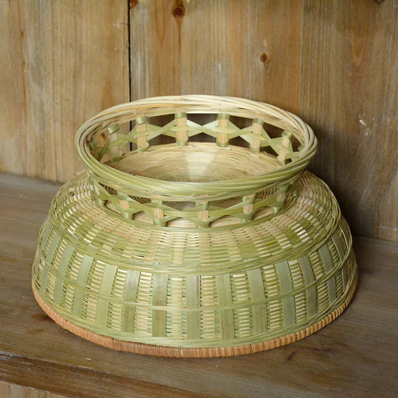 Handmade natural bamboo storage basket in woven construction showing three size options