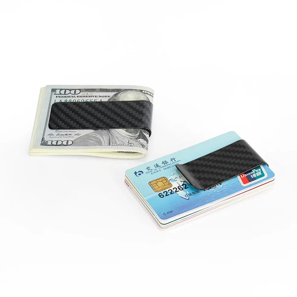 Glossy black carbon fibre money clip with striped pattern on white background