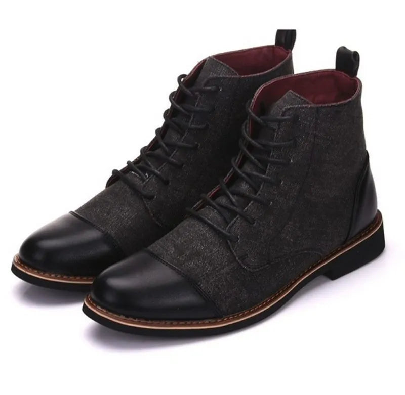 Men's leather motorcycle-style boots with metal belt buckles on a rubber sole, shown in black.