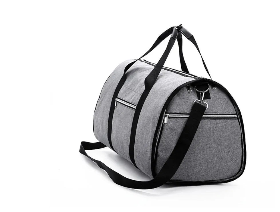 Medium-sized cylinder travel bag in Oxford cloth, shown in one of four colours: black, blue, light grey or red.