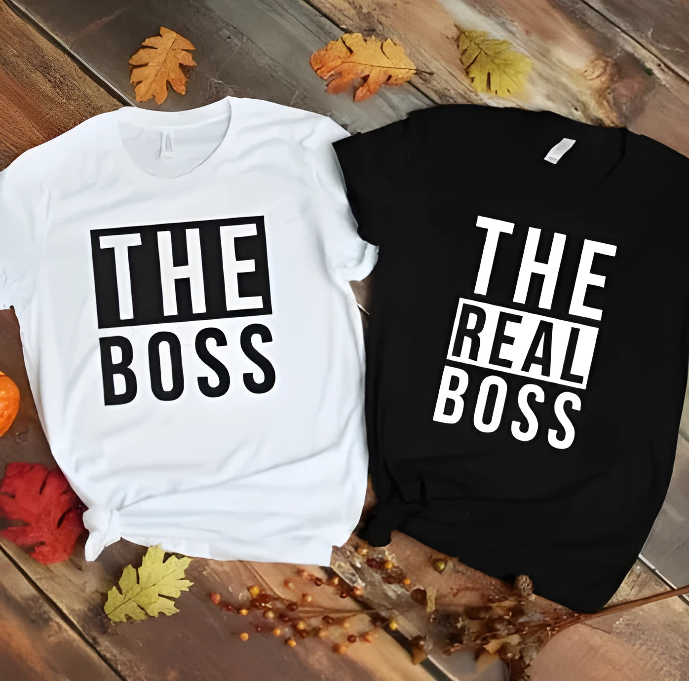 Men's loose fit round neck T-shirt with a printed graphic, short sleeves, on a white background.