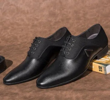 Men's black Oxford shoe with a low-cut artificial PU upper and rubber sole on a white background.