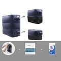 Gray inflatable foot pad with push-on button and adjustable storage bag containing travel accessories