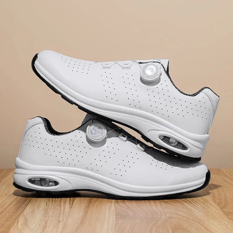 Black and white low-top mesh casual tennis shoes with lace-up front and cross shoulder straps