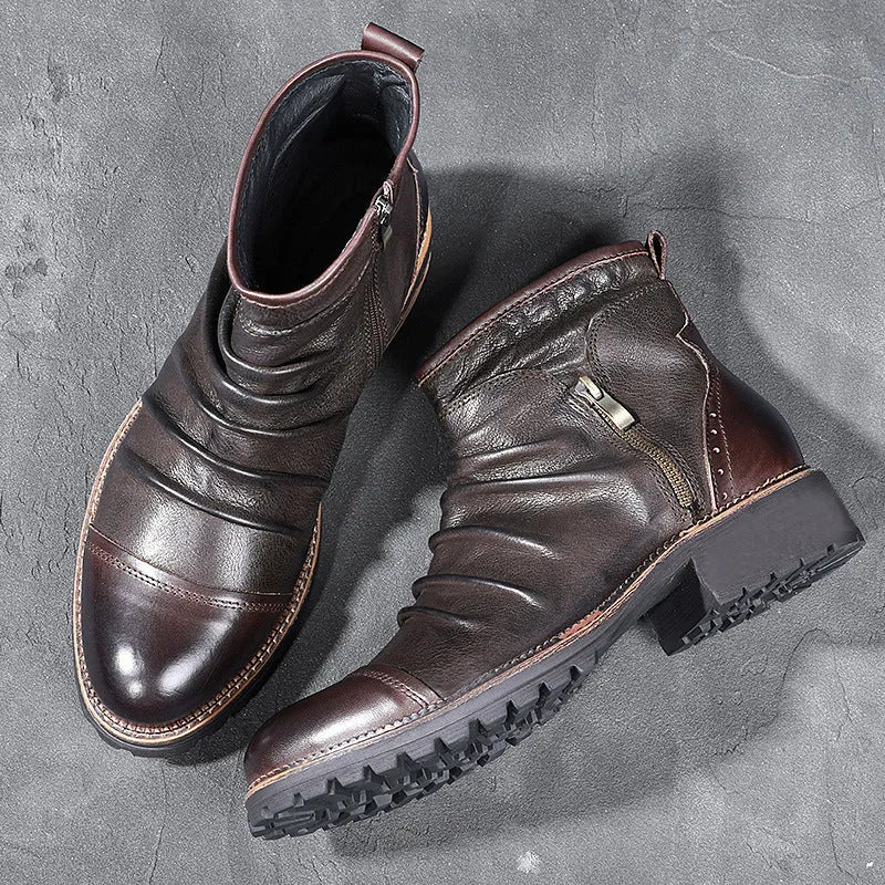 Black and brown mid-calf cowboy boots with a side zipper, round toe, and horseshoe heel