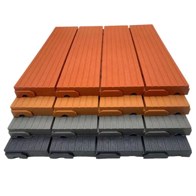 Pack of ten wood grain plastic floor tiles showing splicing edges and non-slip texture