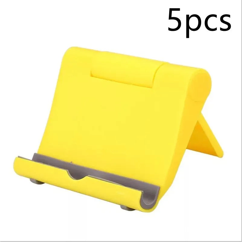 PE folding mobile phone stand in multiple colours showing multi-angle adjustment for tablets and smartphones