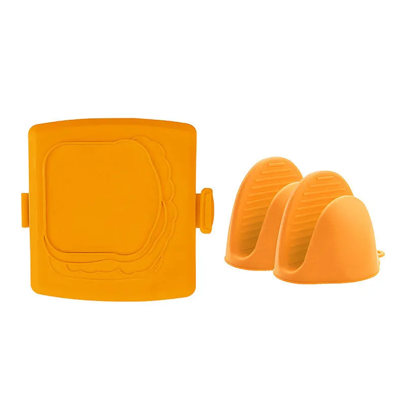 Red silicone baking tray with heat-resistant gloves on kitchen counter