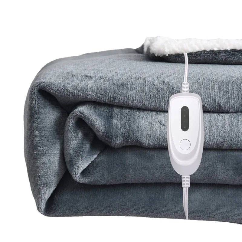 Grey and white USB electric heating blanket with temperature controls on soft flannel fabric.