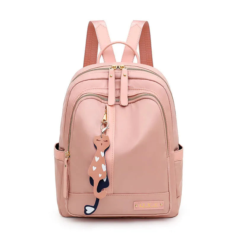 Women's black nylon casual backpack with waterproof construction and anti-theft compartments