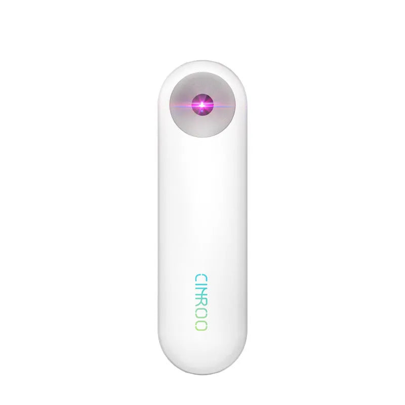White portable UV sterilizer lamp for disinfecting mobile phones and small items.