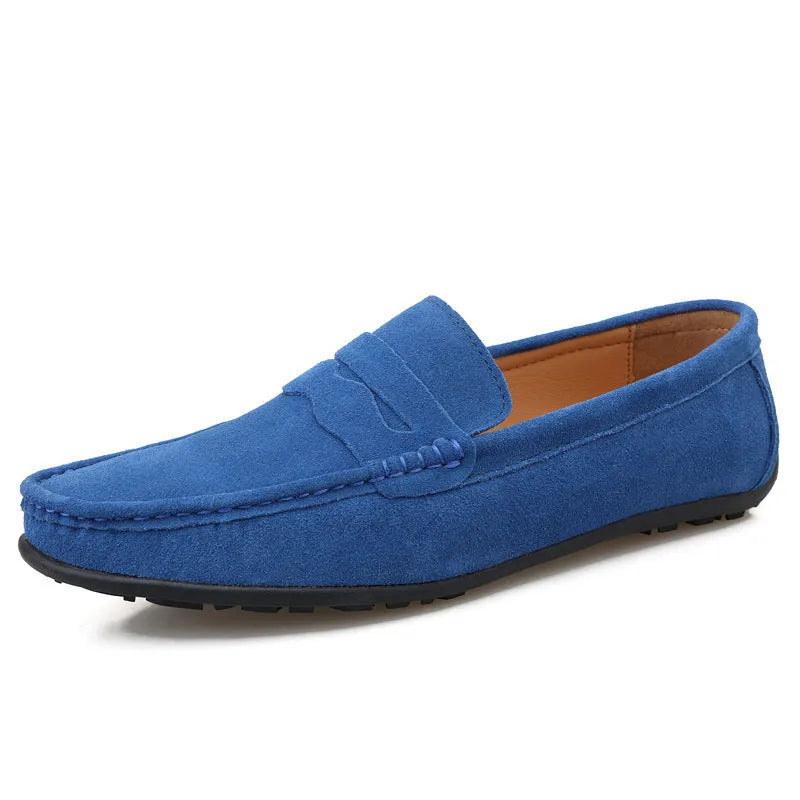 Men's suede slip-on loafers in a solid colour with a round toe and flat rubber sole.